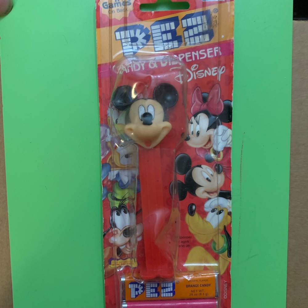 Mickey Mouse Pez packaging slightly opened but hasn’t been taken out.